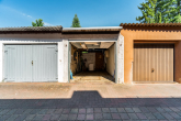 Garage - Wohnen mit Mehrwert – 3-Zimmer-Eigentumswohnung inklusive Garage und kleiner Gartenfläche