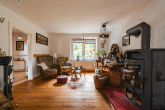 Wohnzimmer - Großzügiges Einfamilienhaus am Feldrand – viel Platz für Familie, Hobby und eigene Ideen