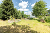 Bild - Wohnen mit Werkstatt und Gartenparadies