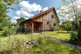 Bild - Wohnen mit Werkstatt und Gartenparadies