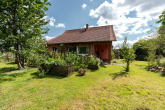 Bild - Wohnen mit Werkstatt und Gartenparadies