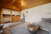 Wohnzimmer/Küche - Wo Sommer nach Kaminofenduft und Seeluft schmeckt: Ferienhaus in Granzow