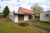 Garage - Ehemalige Schule in Seenähe mit Charme, Geschichte und vielseitigem Nutzungspotenzial