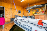 Bild - Ihr Rückzugsort am Wasser – Bootshaus mit integrierter Bootsbox