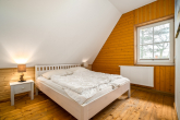 Schlafzimmer DG I - Zeitlose Inselarchitektur trifft modernen Wohnkomfort – Ein Wohntraum auf Ummanz