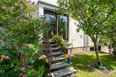 Garten - Doppelhaushälfte – Familienidylle mit Garten, Kamin und Garage