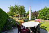 Garten - Doppelhaushälfte – Familienidylle mit Garten, Kamin und Garage