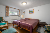 Gästezimmer KG - Doppelhaushälfte – Familienidylle mit Garten, Kamin und Garage