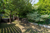 Garten - Doppelhaushälfte – Familienidylle mit Garten, Kamin und Garage