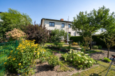Garten - Doppelhaushälfte – Familienidylle mit Garten, Kamin und Garage